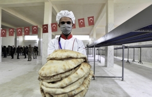 Türkiye'nin desteğiyle Barış Pınarı bölgesinde bir okul ve fırın daha açıldı