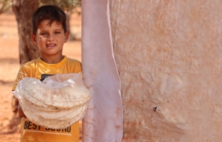 İHH, Suriye'de 9 ayda 70 milyon ekmek dağıttı